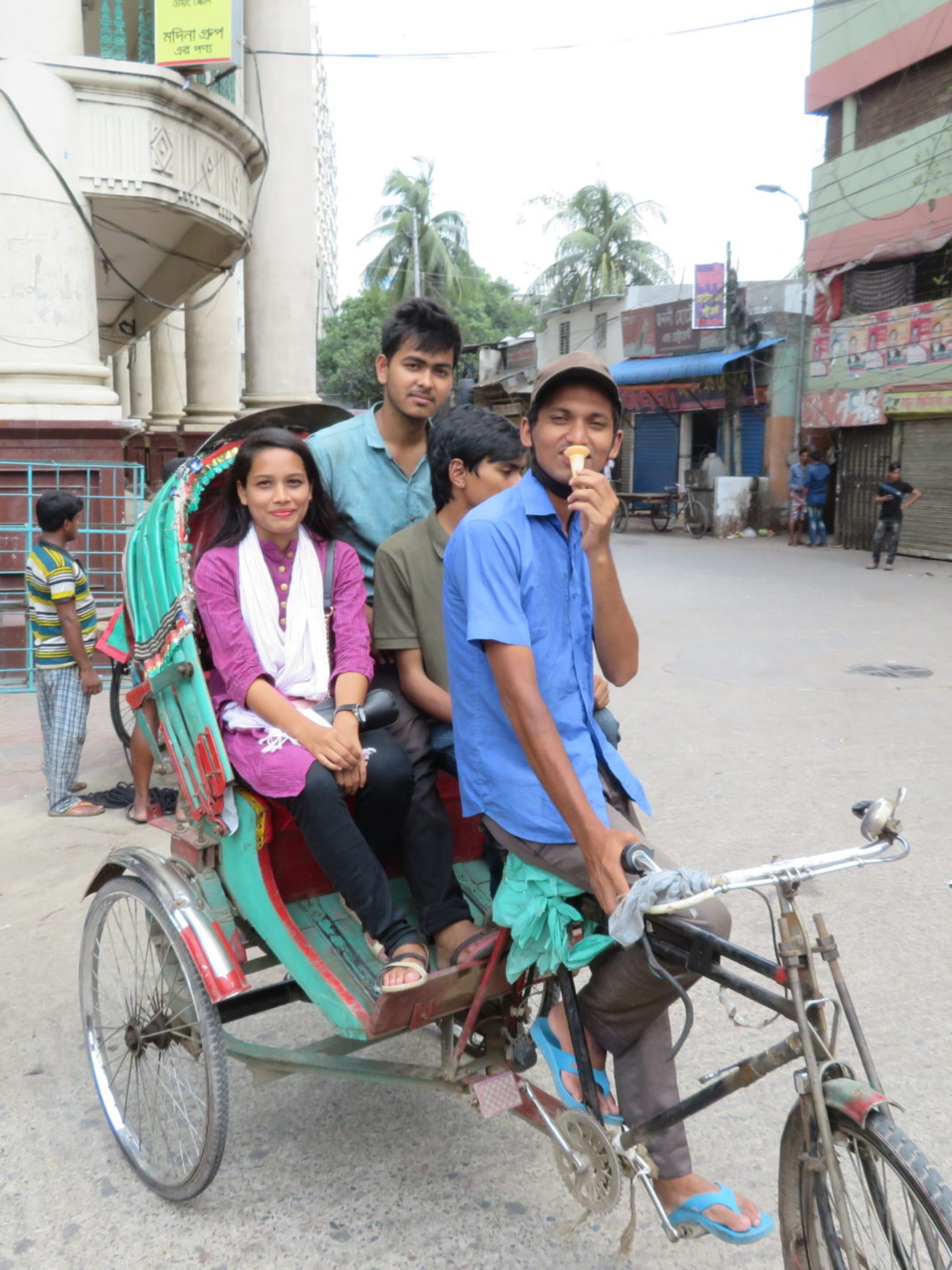 Family Enjoying Rickshaw Ride In Dhaka Bangladesh
